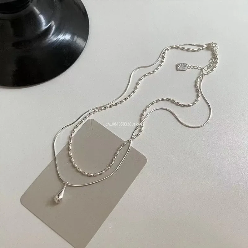 Neue Silber Einfache Design Tropfen Anhänger Halskette Für Frauen Doppel Kragen Kette Mode Edlen Schmuck Geschenke Lange Layered Halskette Neue Silber Einfache Design Tropfen Anhänger Halskette Für Frauen Doppel Kragen Kette Mode Edlen Schmuck Geschenke Lange Layered Halskette