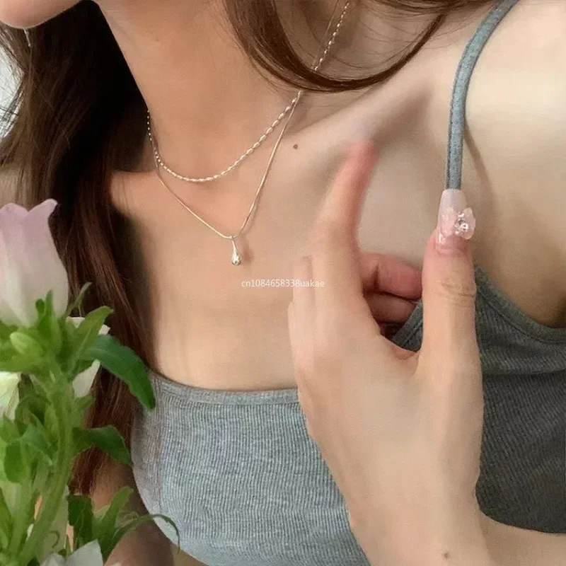 Neue Silber Einfache Design Tropfen Anhänger Halskette Für Frauen Doppel Kragen Kette Mode Edlen Schmuck Geschenke Lange Layered Halskette Neue Silber Einfache Design Tropfen Anhänger Halskette Für Frauen Doppel Kragen Kette Mode Edlen Schmuck Geschenke Lange Layered Halskette - Image 2