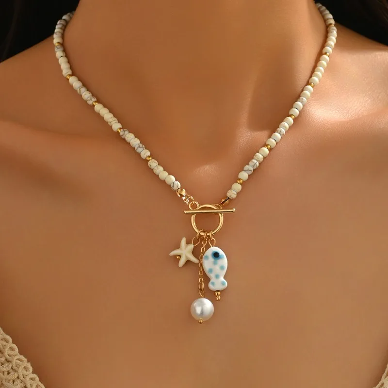 Bohemian Seestern Anhänger Halskette Mit Ot Schnalle Frauen Handgemachte Reis Perlen Keramik Fisch Halsband Halskette Strand Schmuck Geschenke Bohemian Seestern Anhänger Halskette Mit Ot Schnalle Frauen Handgemachte Reis Perlen Keramik Fisch Halsband Halskette Strand Schmuck Geschenke - Image 2