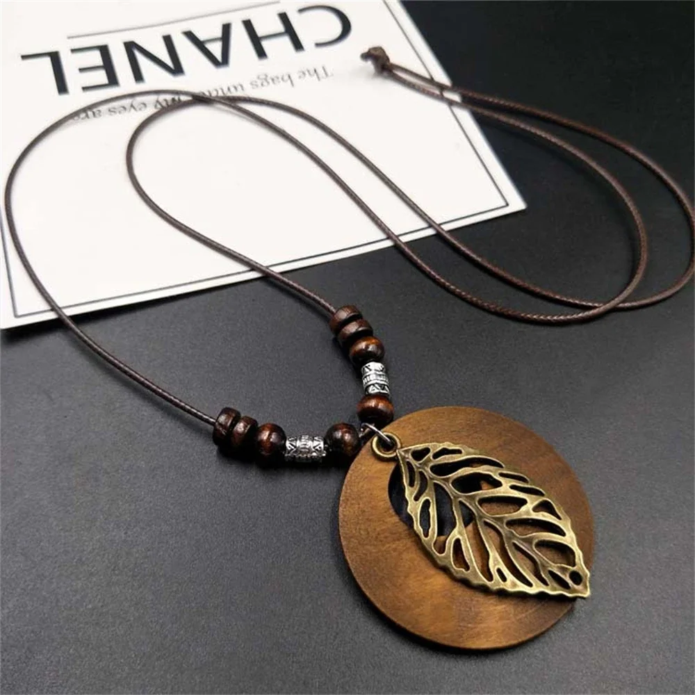 Vintage Folk Stil Holz Perlen Anhänger Halskette Für Frauen Choker Lange Wachs Gewinde Zink-Legierung Pullover Kleid Halskette Vintage Folk Stil Holz Perlen Anhänger Halskette Für Frauen Choker Lange Wachs Gewinde Zink-Legierung Pullover Kleid Halskette